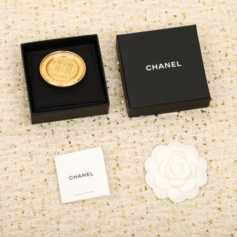 Ch*el brooches